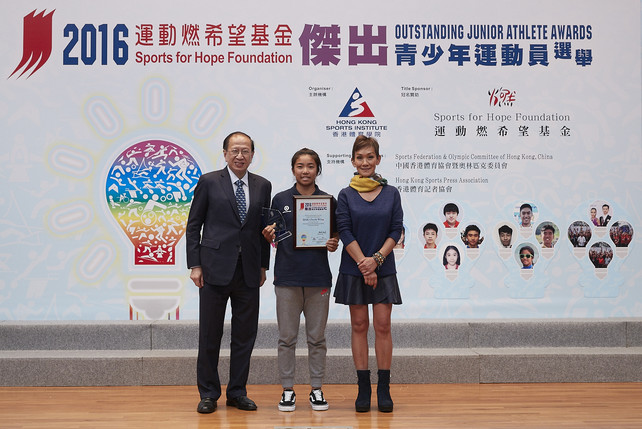 Miss Marie-Christine Lee, Founder of the Sports for Hope Foundation (right) and Mr Pui Kwan-kay SBS MH, Vice-President of the Sports Federation & Olympic Committee of Hong Kong, China (left), awarded trophy and certificate to Mak Cheuk-wing (Windsurfing, centre), the winner of the Most Outstanding Junior Athlete Award of 2016.